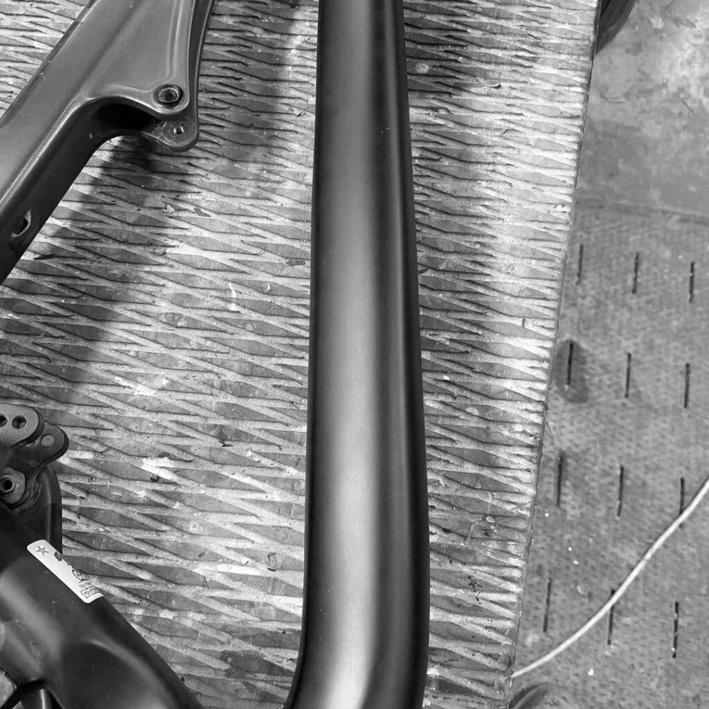 A Painted and Repaired hole in a Carbon Fibre Mountain Bike